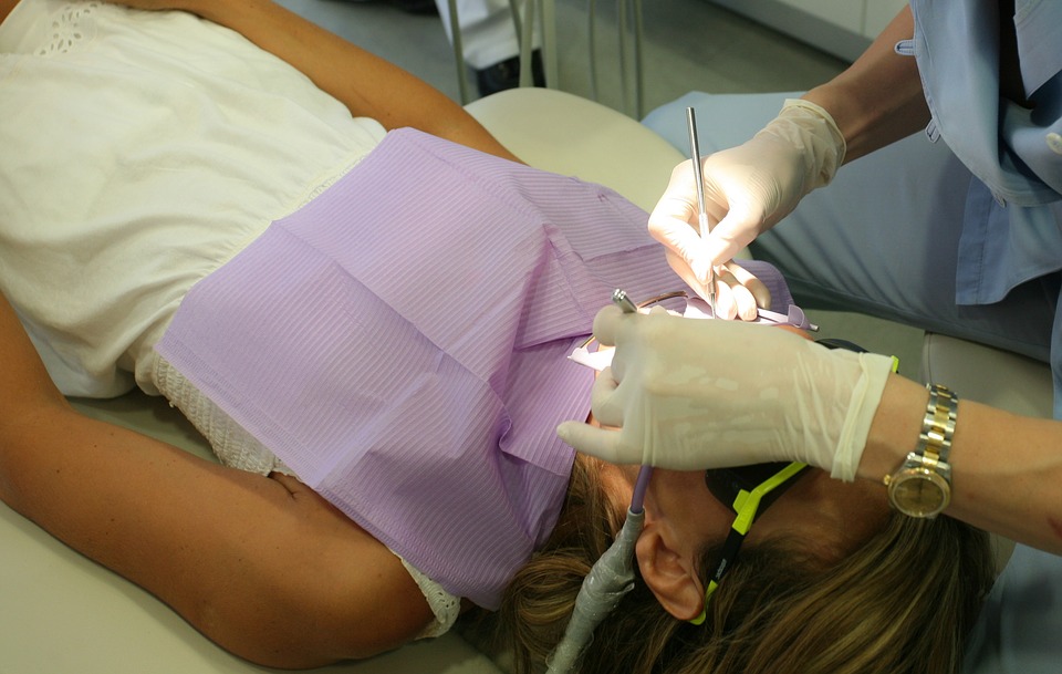 someone doing dental care
